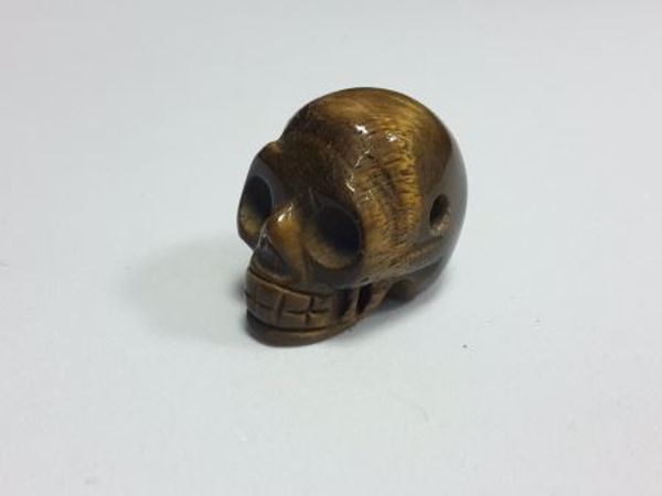 Imagen de Colgante calavera de piedra natural ojo tigre