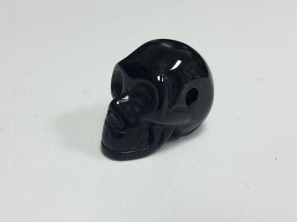 Imagen de Colgante calavera de piedra natural onix